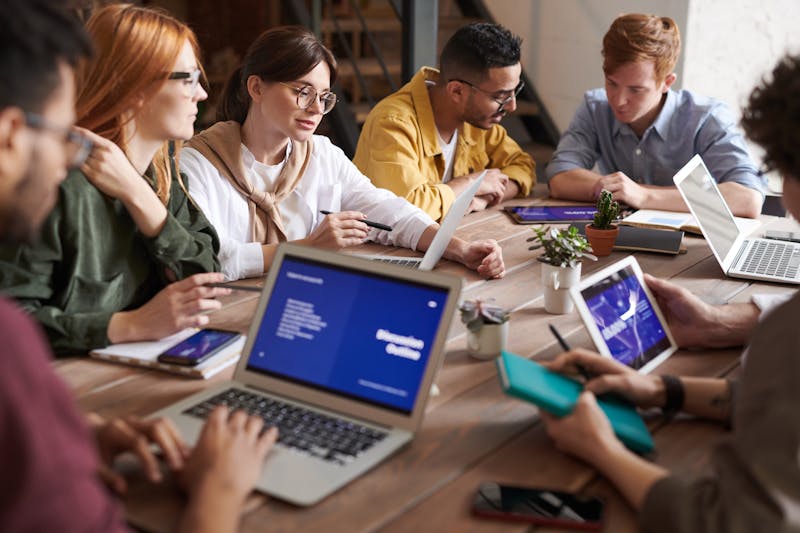 Professional team reviewing QCTO assessment results in collaborative session