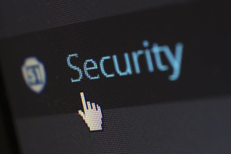 Security shield and lock representing compliance and data protection